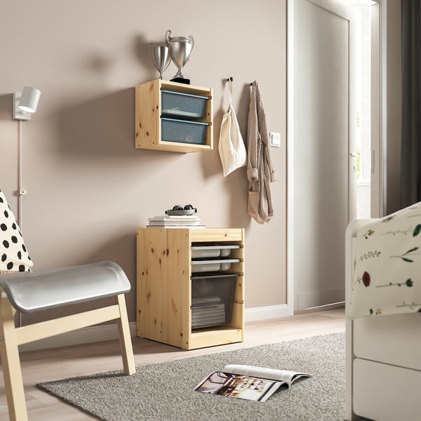 TROFAST storage units for kids. Wooden & mesh, beside chair, cozy rooms.