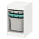 A white TROFAST storage unit with turquoise and dark grey trays and a grey storage box.