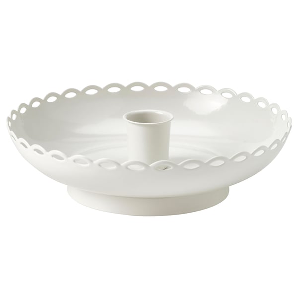 Round white ceramic candlestick with scalloped edge and central tube for candle.