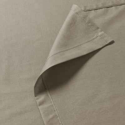 Folded light brown ULLVIDE bed sheet, smooth texture, neatly stacked, soft, breathable cotton-lyocell blend.