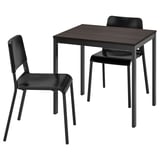 Black extendable dining table with 2 matching chairs, dark wood top, metal legs, plastic seats & backs.