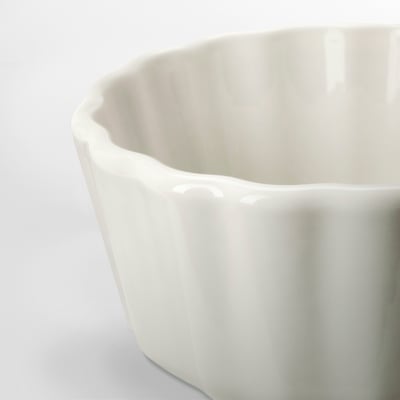 VARDAGEN white bowl, made of stoneware, round shape with fluted design.