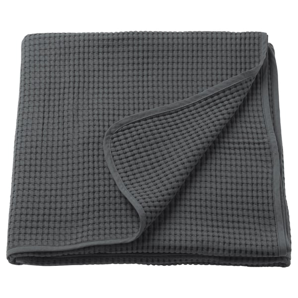 VÅRELD grey cotton bedspread, square folded, textured weave design.