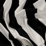 Black and white striped fabric, crisp and neatly arranged, ideal for crafting.