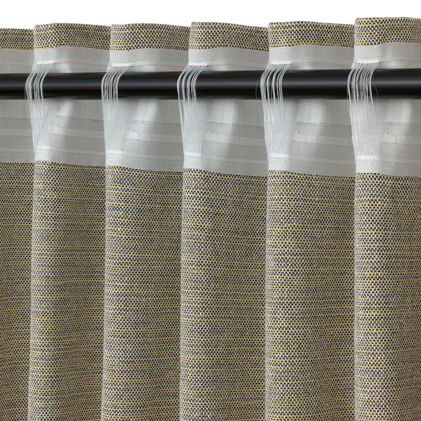 Close-up of hanging curtains with yellow and blue fringes, showcasing recycled fabric texture and pleated design.