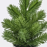 Artificial christmas tree with vibrant green, lifelike needles. Recycled plastic, environmentally friendly.