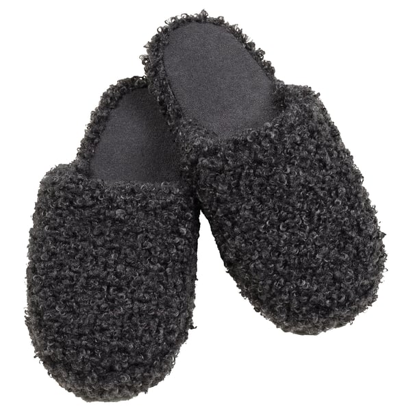 Black cozy slippers, textured knit design, foam sole for comfort and grip.