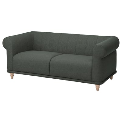 Dark green fabric sofa with rolled arms, soft cushions, and wooden legs. Classic, inviting design.