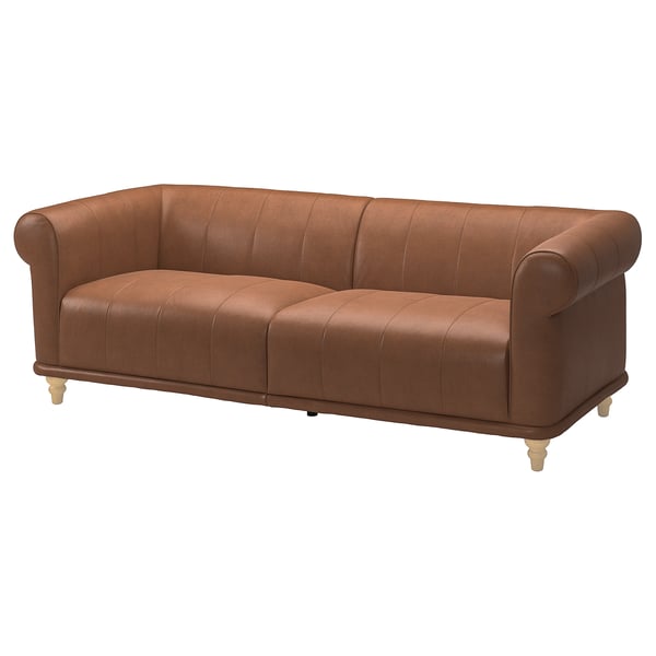 Classic VISKAFORS leather sofa with soft, rounded shapes and generous armrests. Comfortable cushioned seat.