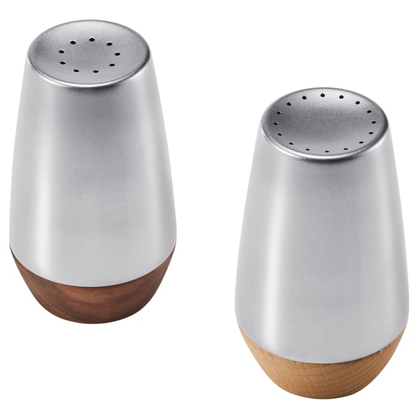 Dos saleros y pimenteros AFTONHAJ plateados con bases de madera, forma cilíndrica y diseño elegante.