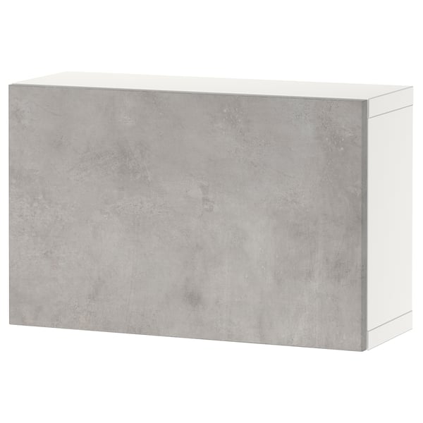 Mueble de almacenaje minimalista BESTÅ en color gris con efecto cemento.