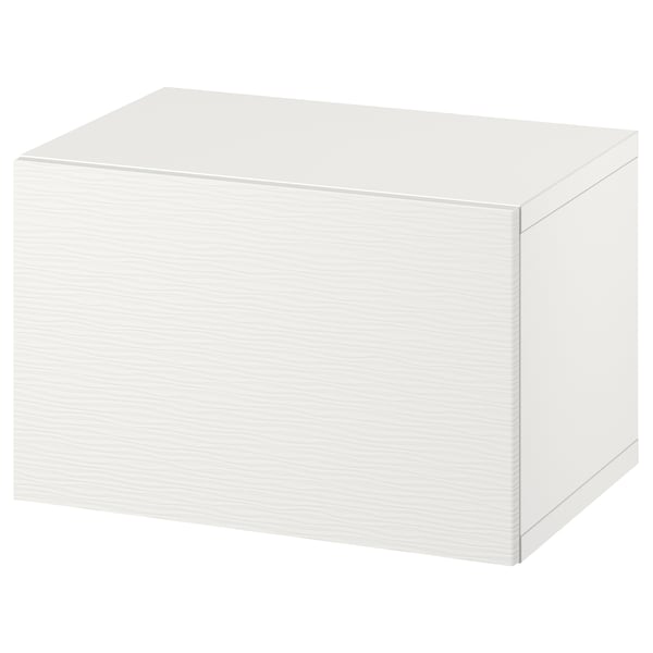 Representa un mueble de almacenamiento BESTÅ blanco. Es de forma rectangular y diseño sencillo, ideal para ambientes minimalistas y modernos.