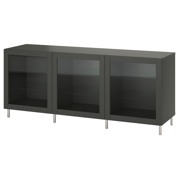 Almacenamiento BESTÅ negro con puertas de vidrio y patas de metal, 3 compartimentos ajustables.