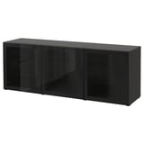 Aparador BESTÅ negro de ikea con puertas de cristal, diseño elegante y rectangular, perfecto para el almacenamiento.