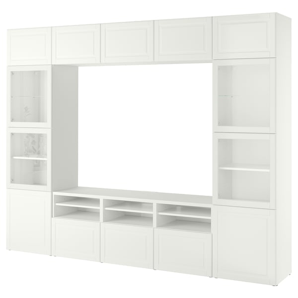 Mueble de TV BESTÅ blanco con estantes y armarios para almacenamiento y exposición.