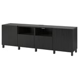 Un mueble de almacenamiento de tv ikea BESTÅ gris oscuro. Cuenta con múltiples puertas y cajones para el almacenamiento, con un diseño moderno y rectangular y elegantes patas negras.