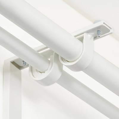 Soporte de barra de cortina con tiras antideslizantes. Soporta un máximo de 3 kg.