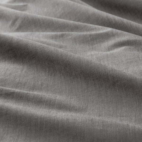 Primer plano de tejido suave y nítido con sutiles rayas estampadas; Tejido de algodón de alta calidad.