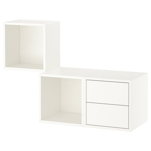 Muebles de almacenamiento modulares blancos, cuadrados y rectangulares con secciones abiertas y cerradas.