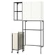 Un mueble de almacenaje modular ENHET blanco y negro con estantes y bolsa de lavandería.