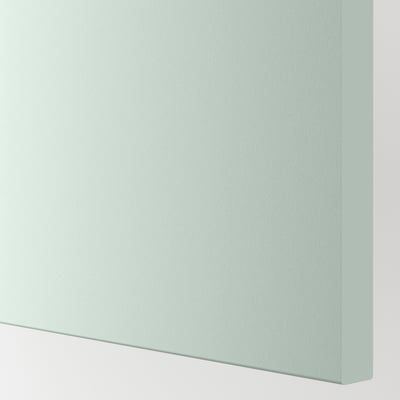 Mueble de baño de color verde grisáceo pálido, elegante y moderno, con acabado liso y bordes limpios.
