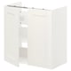 Mueble de baño ENHET blanco, estante revelador de una puerta abierta.