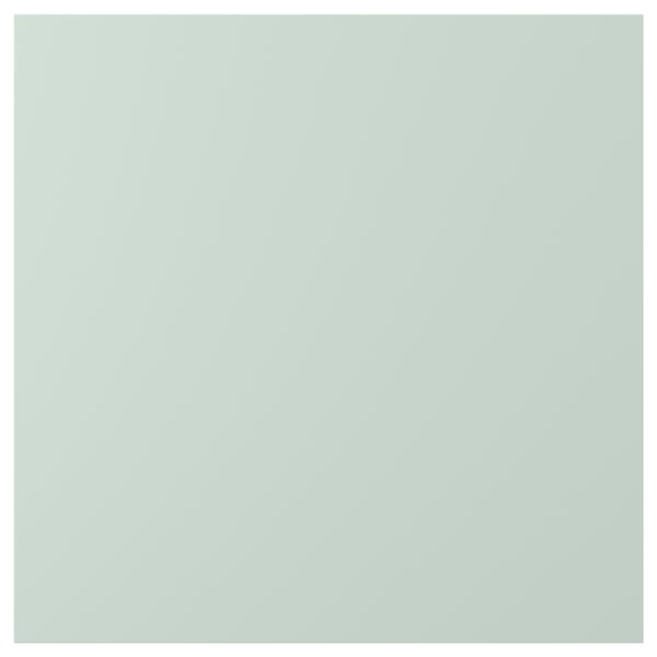 Una puerta de armario ENHET de color verde grisáceo pálido con una superficie lisa y forma rectangular. La puerta está hecha de tableros de partículas y cubierta con lámina de plástico.