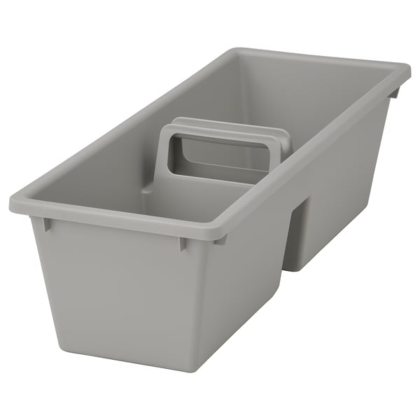 Se trata de un organizador de cajones de plástico gris FÅNGGRÖDA con dos compartimentos y un asa.