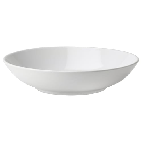 Un solo cuenco de cerámica blanca con bordes lisos, sencillo y elegante para diversas ocasiones.