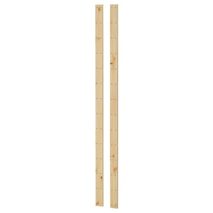 Dos tablones verticales de madera, de color claro, colocados uno al lado del otro, forman parte del sistema de almacenamiento HEJNE de ikea.