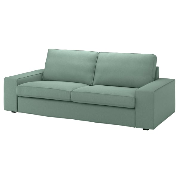 Sofá moderno de tela verde con cojines, diseño cuadrado.