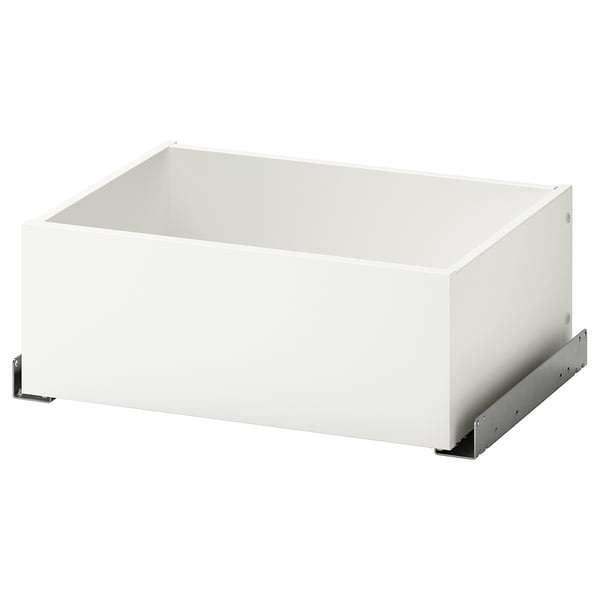 Un cajón KOMPLEMENT blanco, de forma rectangular con soportes metálicos en la parte inferior. Es minimalista y está pensado para organizar la ropa.