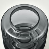 Jarrón de vidrio transparente de alta calidad con textura suave y uniforme, visto desde arriba.