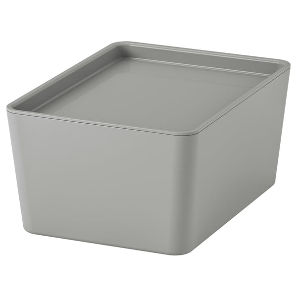 Una caja organizadora de plástico KUGGIS gris claro con bordes redondeados y un diseño sencillo, perfecta para clasificar objetos pequeños.
