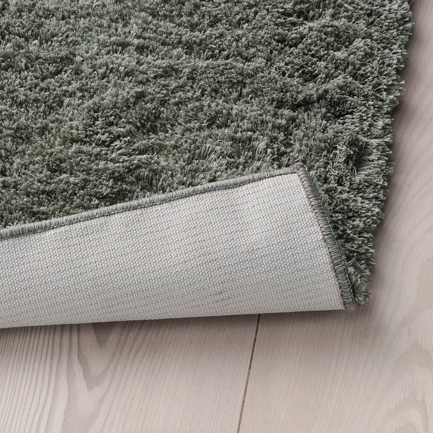 LINDKNUD Alfombra, pelo largo - gris oscuro - IKEA