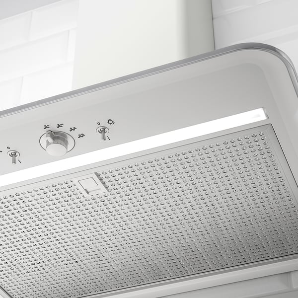 Campana de cocina moderna con pomos redondos, iluminación led.