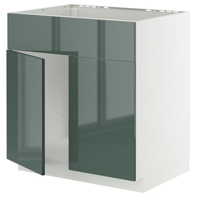 Moderno mueble de cocina METOD con puertas de color verde grisáceo de alto brillo, forma cuadrada y diseño elegante.