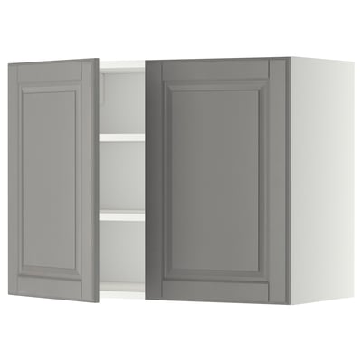 Mueble de cocina METOD en color gris con dos puertas y estante, montado en la pared.