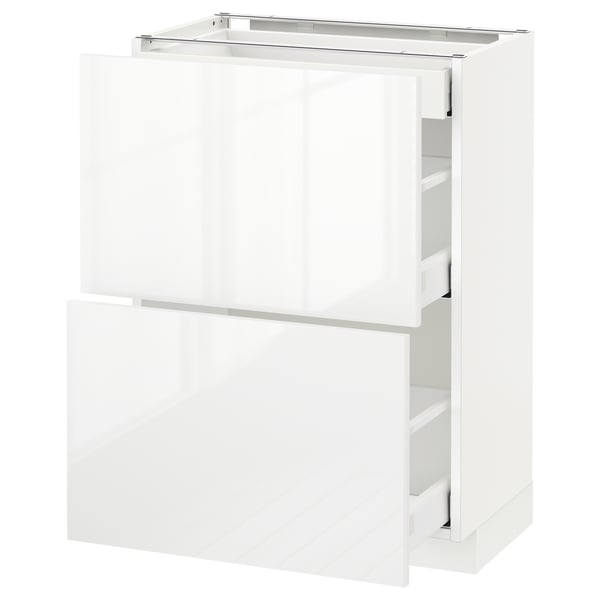 Un mueble de cocina METOD blanco de ikea con frentes ringhult de alto brillo y varios cajones.