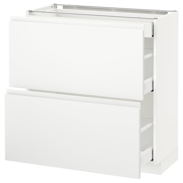 Mueble de cocina moderno blanco con diseño minimalista y tiradores integrados.