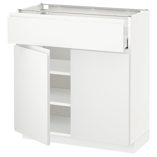 Un mueble de cocina METOD blanco con cajón y estante abierto, que forma parte de la serie voxtorp moderna y minimalista de ikea.