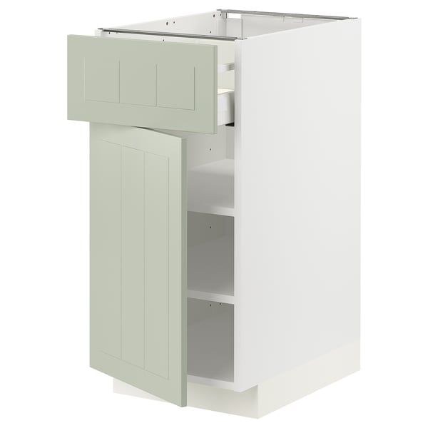 Mueble de cocina METOD de Ikea en color verde con estantes ajustables y cajón liso.