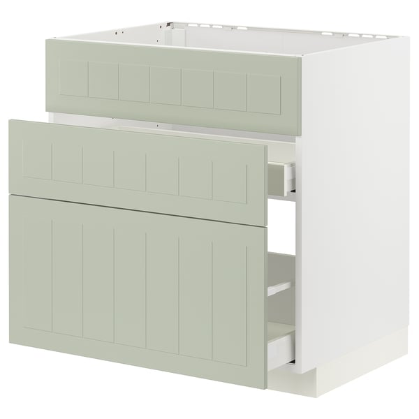 Muebles de cocina IKEA METOD blancos y verdes con cajones y armario.