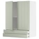 Un mueble de cocina METOD verde con cajones y estantes ajustables.