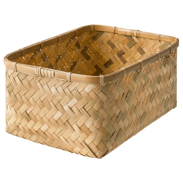 Cesta de almacenamiento de bambú tejida a mano. Color natural, forma rectangular, diseño robusto.
