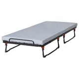 Una cama de invitados NORRUDDEN gris plegada con estructura y acolchado de metal, diseñada para un fácil almacenamiento y uso.