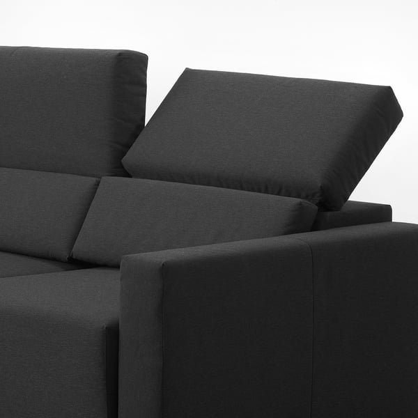 Moderno sofá modular negro con respaldos ajustables y acolchados, ideal para mayor comodidad y versatilidad.