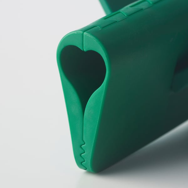 Abrazadera de plástico verde brillante con corte en forma de corazón, diseño duradero, perfecta para sellar bolsas.
