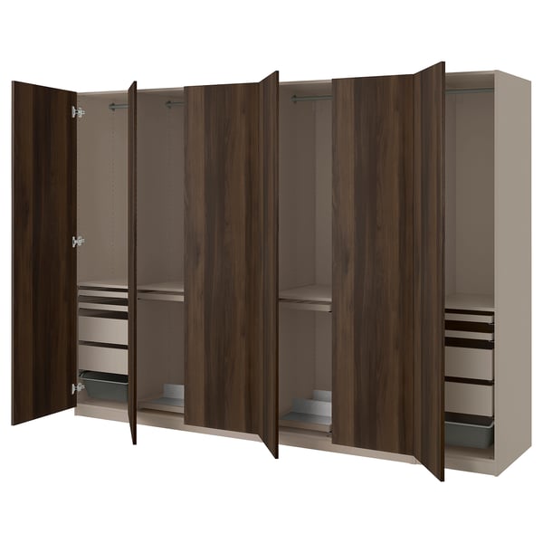 Armario PAX de madera oscura con múltiples compartimentos y estantes.