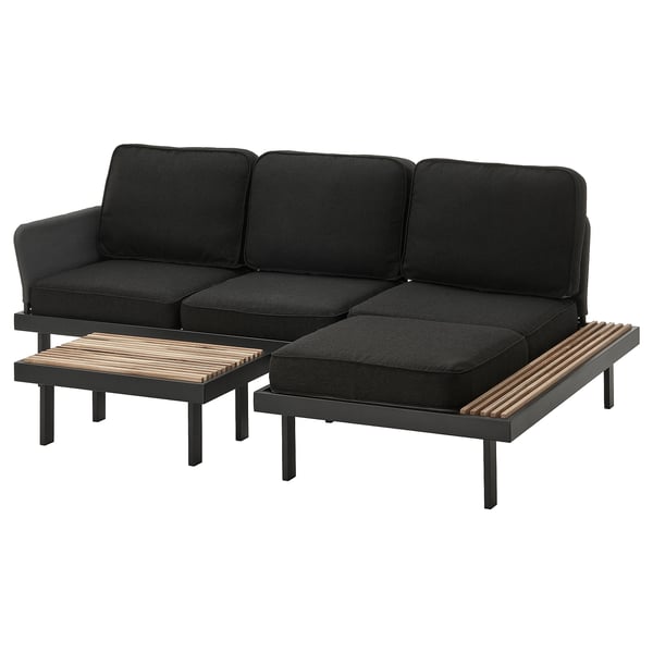 Conjunto de sofá de exterior negro con sofá, mesa y tumbona. Diseño moderno, materiales duraderos.
